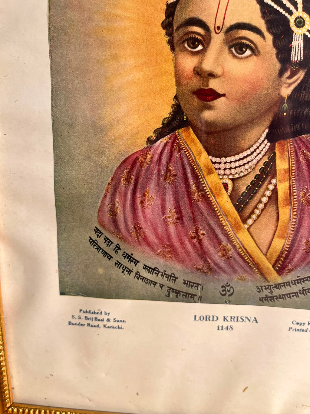Vintage “Lord Krisna” Devotional Portrait Print – S. S. Brij Basi & Sons, Karachi | 10 × 14 Inches