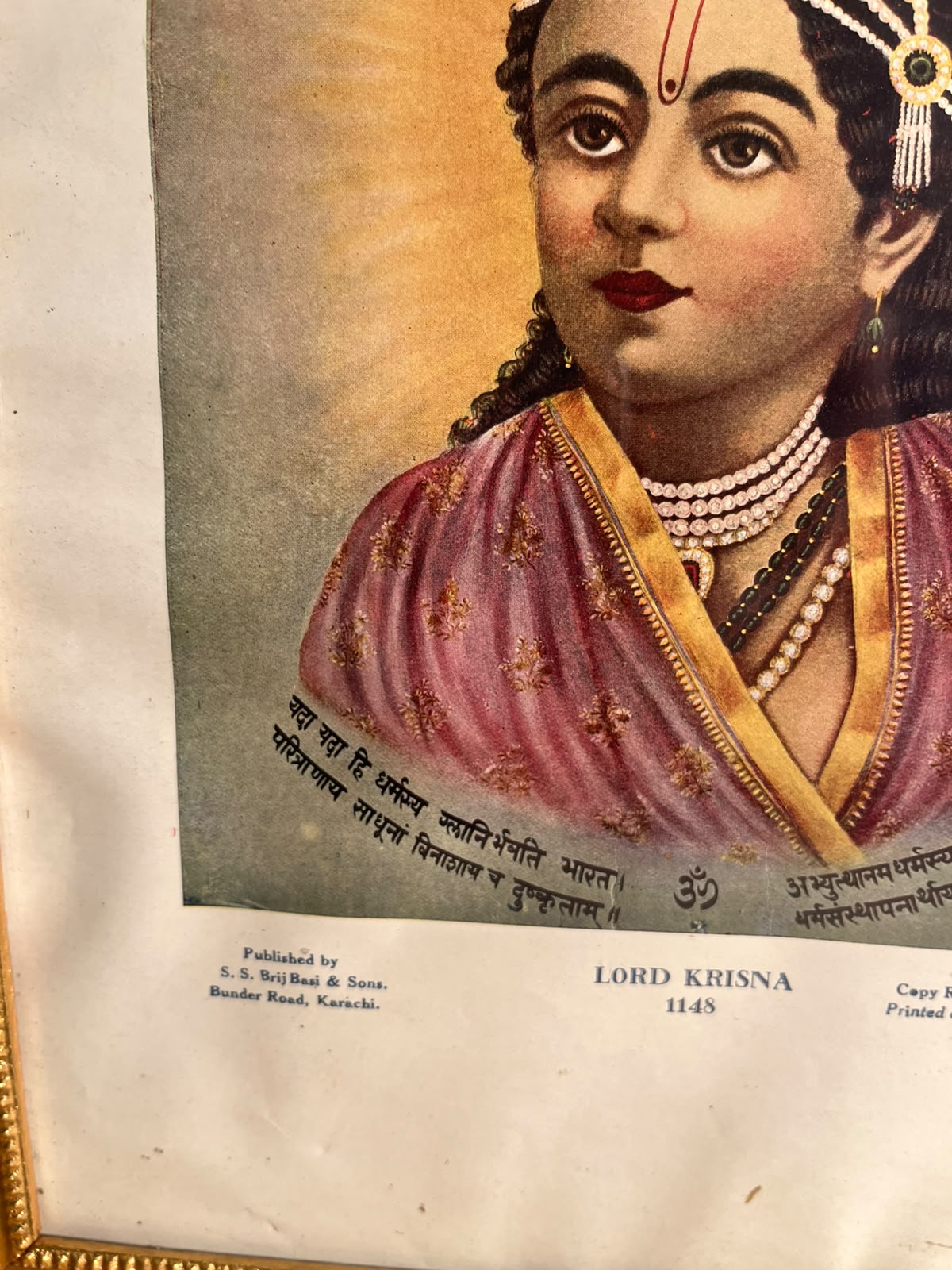 Vintage “Lord Krisna” Devotional Portrait Print – S. S. Brij Basi & Sons, Karachi | 10 × 14 Inches